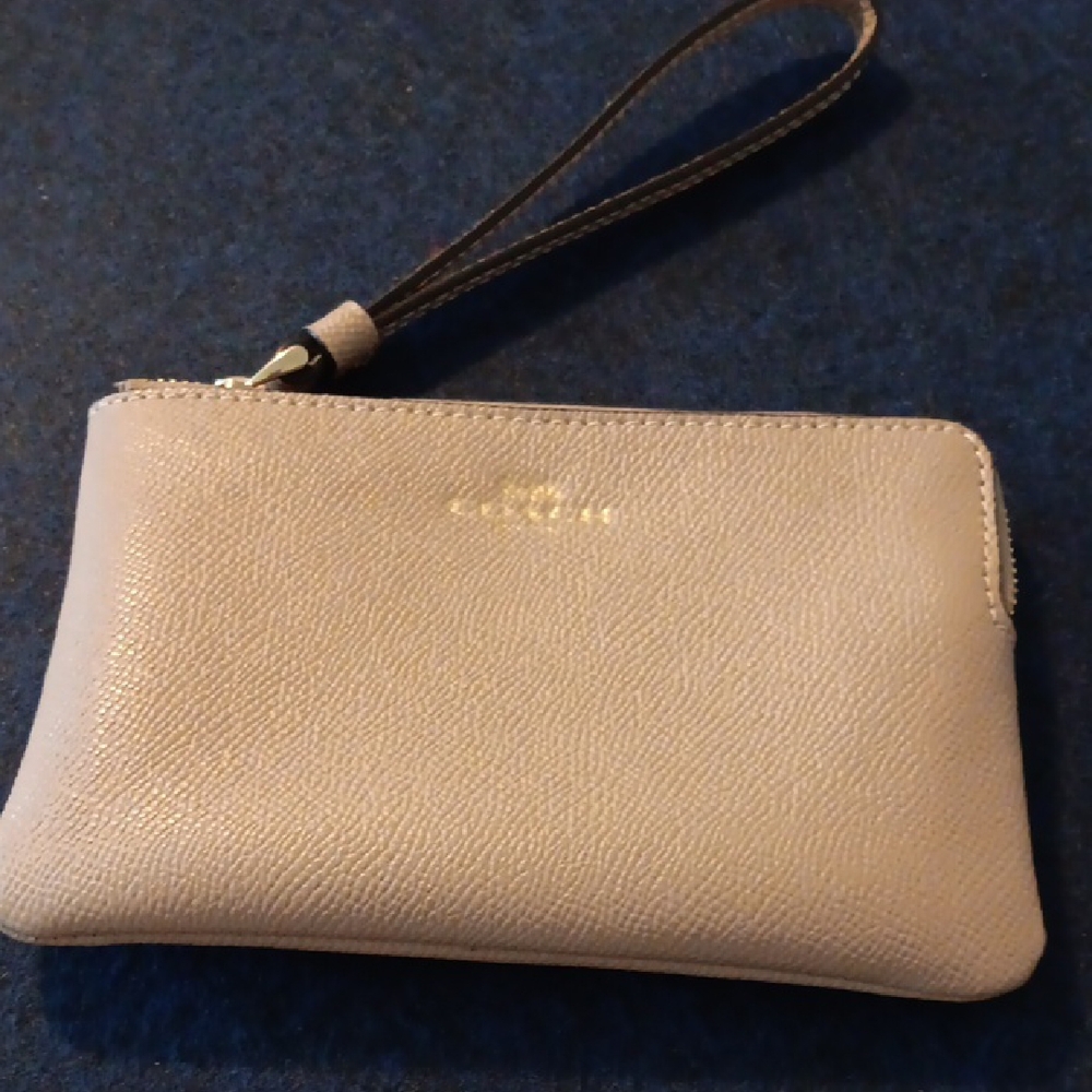 Elegant Cream COACH Wristlet Clutch